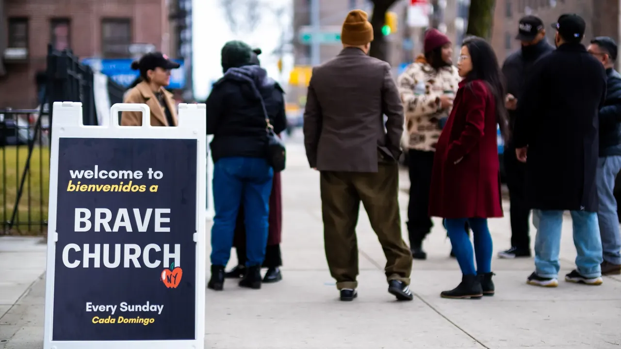 People gathering outside Brave Church